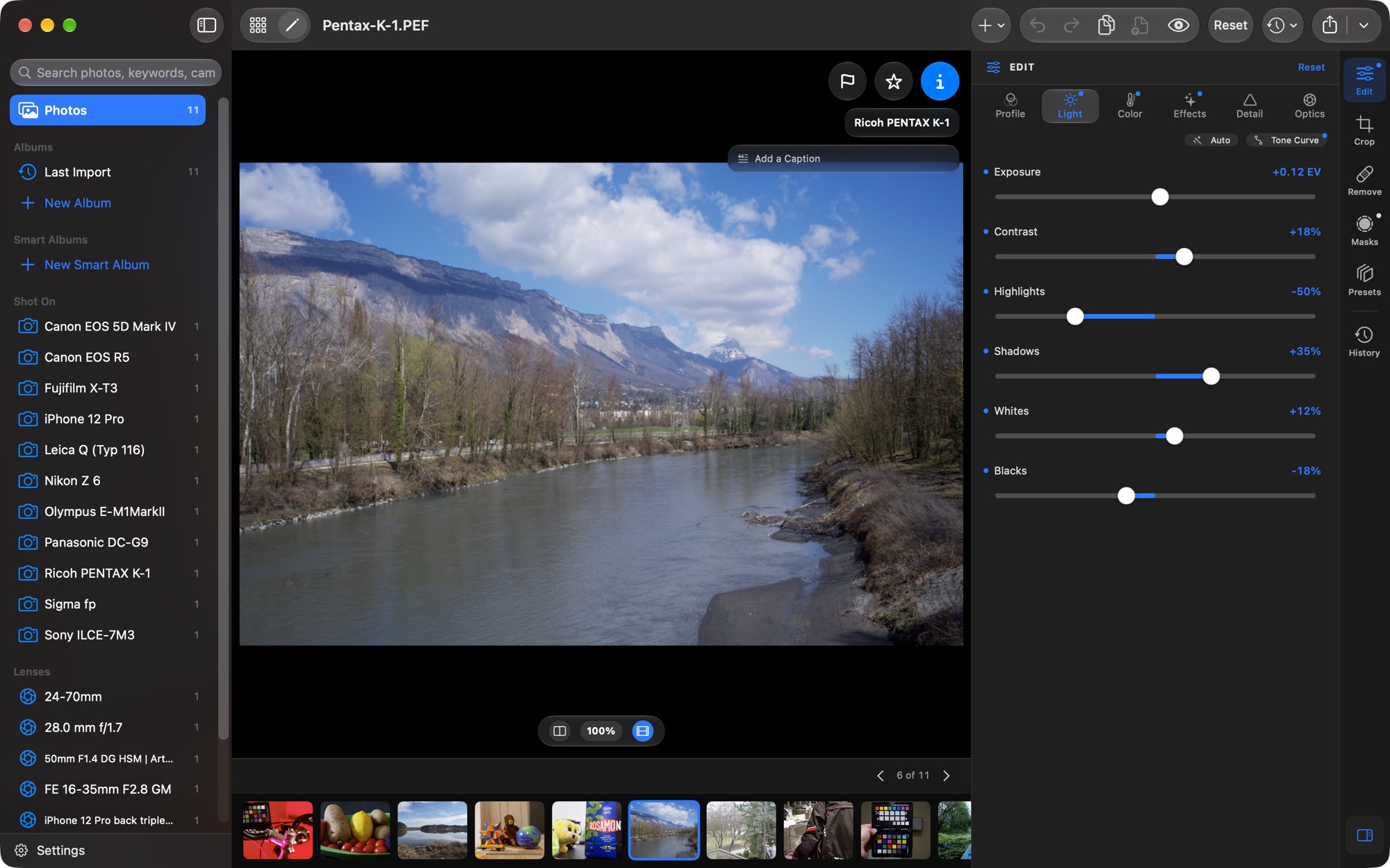 Raw Smith on the Mac: the library sidebar, a Pentax K-1 RAW of a river below mountains, and the Light panel with Exposure, Contrast, Highlights, Shadows, Whites and Blacks
